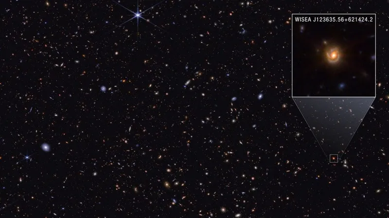 James Webb Space Telescope image of spiral galaxy Saguaro showing a bright red core and sweeping spiral arms