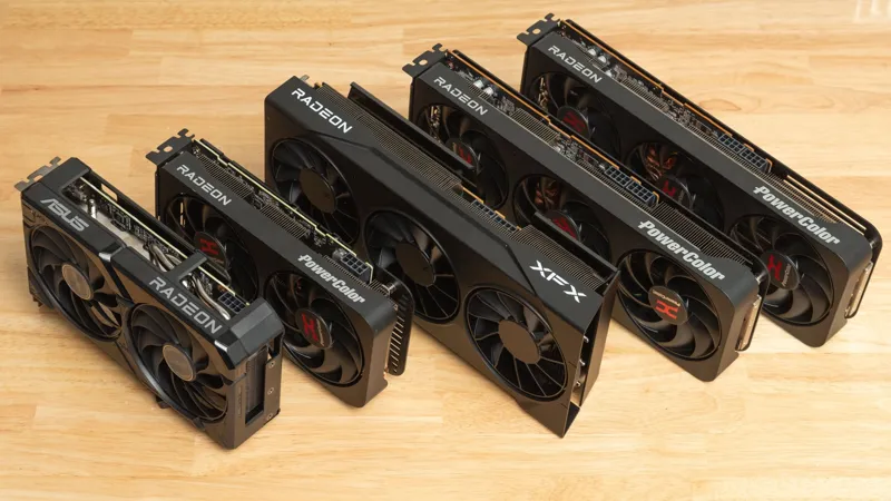 Ряд потужних відеокарт AMD Radeon від PowerColor та XFX викладено на світлій дерев'яній поверхні.