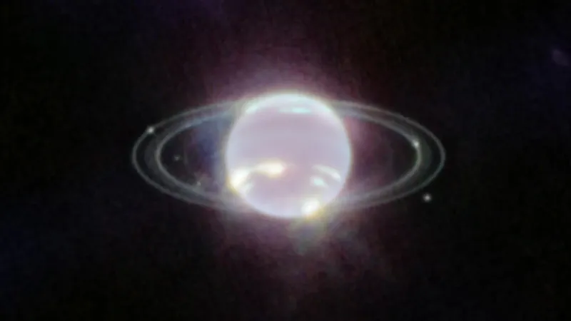 NASA James Webb Space Telescope near-infrared image of Neptune showing its faint rings and inner moons