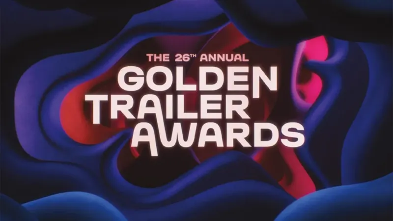 Стилізований логотип Golden Trailer Awards з написом The 26th Annual на темно-синьому фоні, оточеному абстрактними хвилястими фігурами.