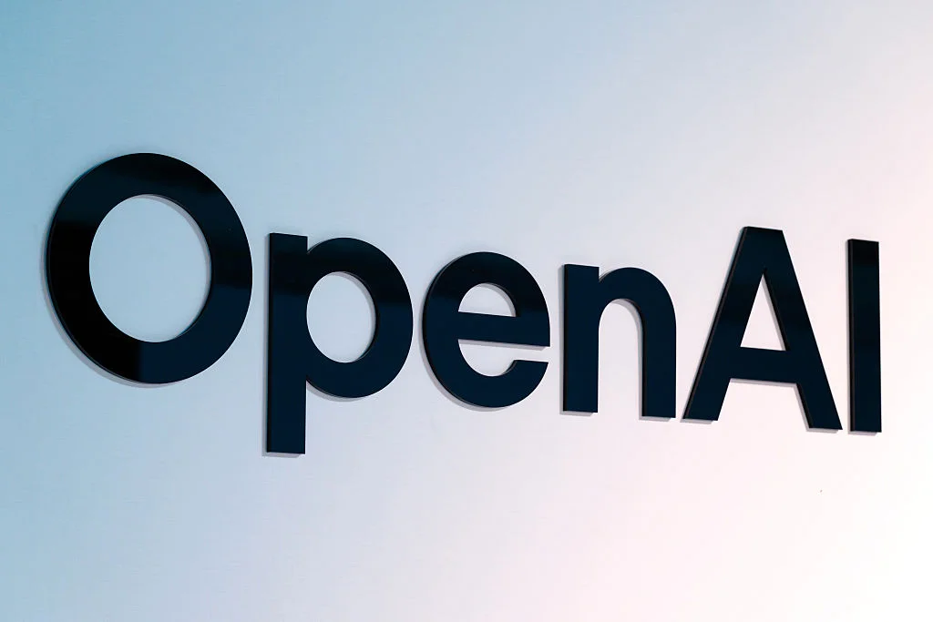 OpenAI signage displayed outside a conference venue