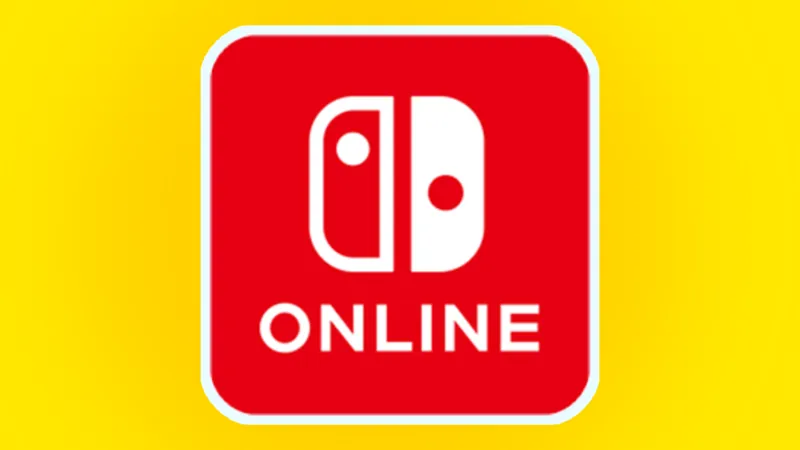 Консоль Nintendo Switch із логотипом сервісу Nintendo Switch Online на тлі ігрових контролерів