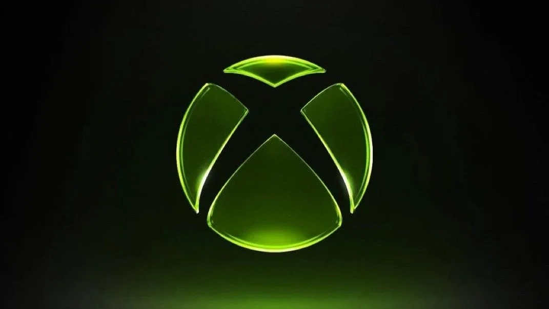 Яскраво-зелений логотип Xbox у стилі неону випромінює світіння на глибокому темному тлі.